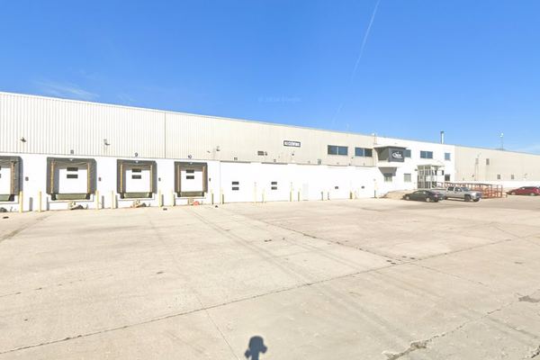 Street-level view of the numbered receiving docks and entry at 2001 Mirro Drive