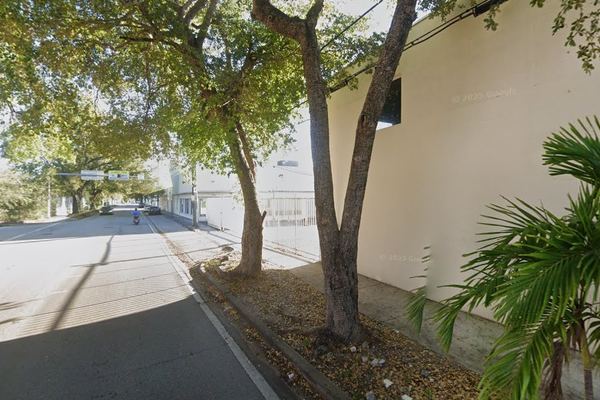 Street-level view along NE 4th Court at the building