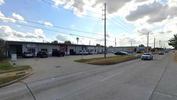 The service-bay building line at 18035–18037 W Little York